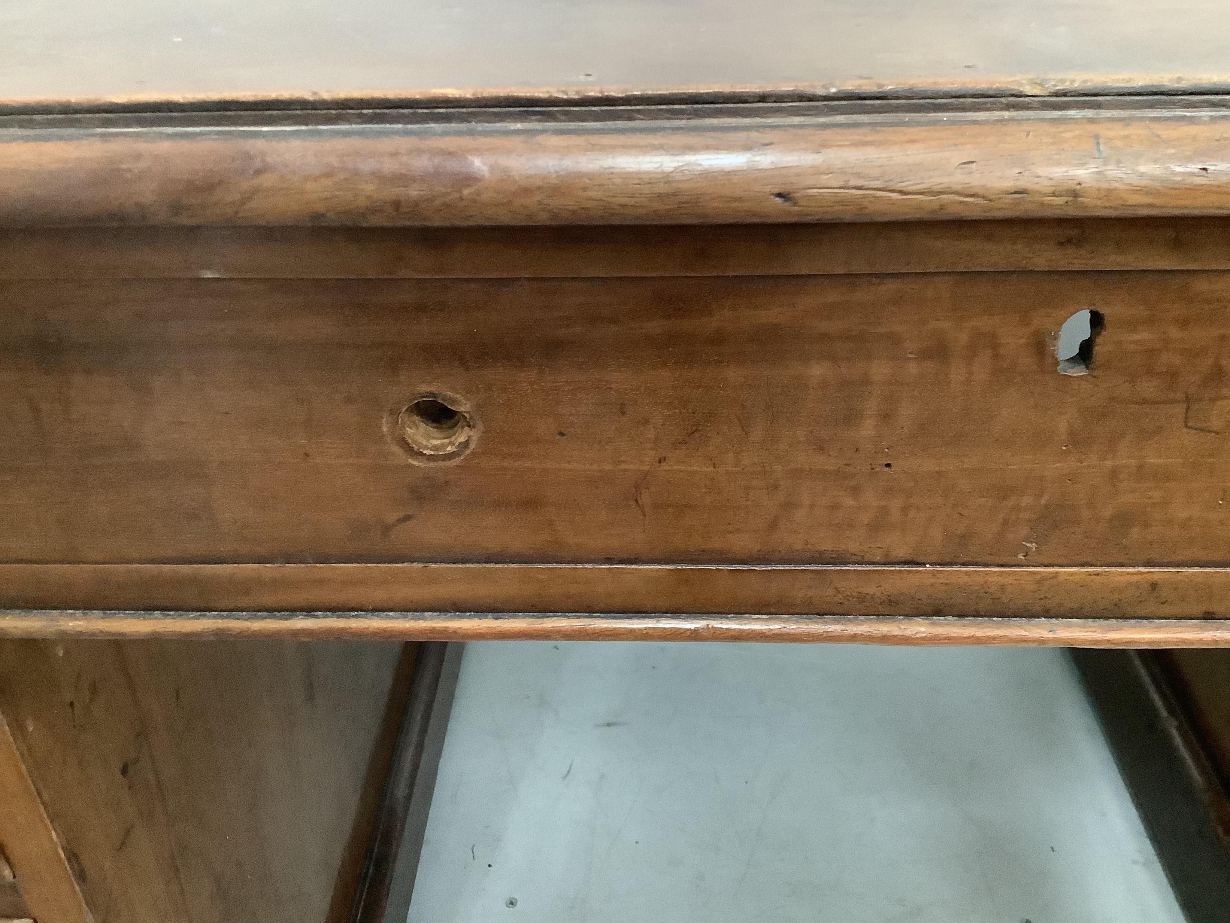 A Victorian mahogany pedestal desk, fitted eight small drawers, boarded top, width 151cm, depth 79cm, height 76cm. Condition - poor